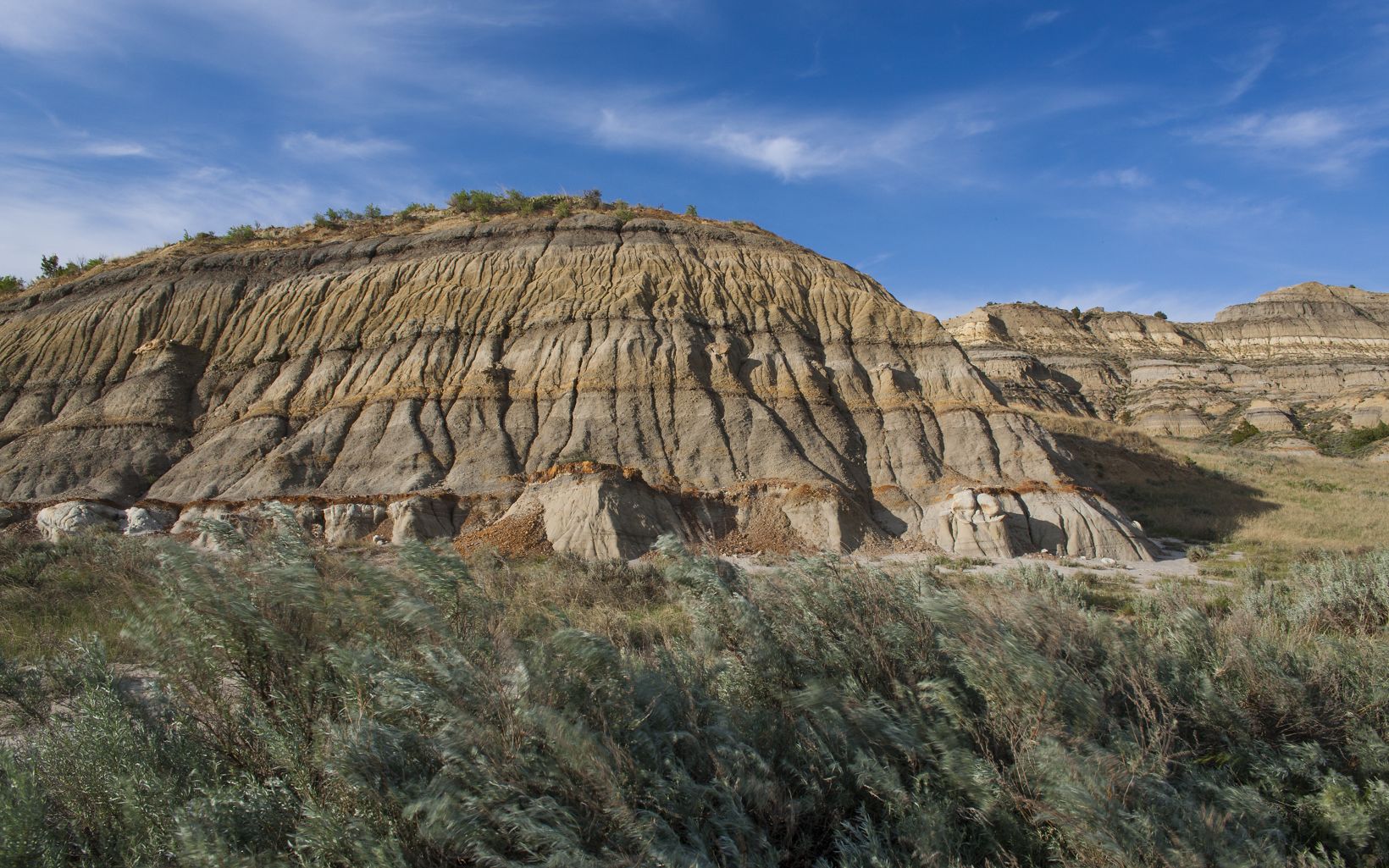 Rock Formations As part of the Badlands, Theodore Roosevelt National Park boats some seriously cool geologic formations. © ©2012 Richard Hamilton Smith