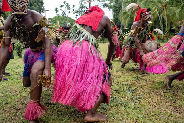 Men perform a cultural dance for visitors in Dangmunduk - Murukanam, Madang Province, Papua New Guinea.