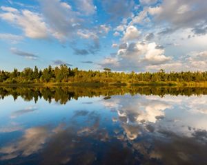 Reflection of clouds on Mink River