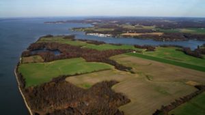 Aerial view of Chesapeake Bay with farmland beside it.
