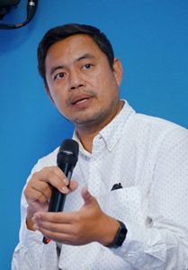 Headshot of Ahmad Baihaki.