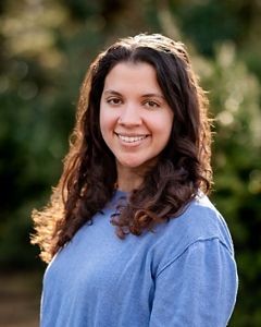 Headshot of Alex Verdeja Perez in a blue sweater. 