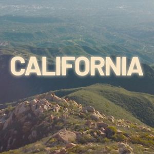 Video still showing a hilly landscape with the word California overlaid on it.