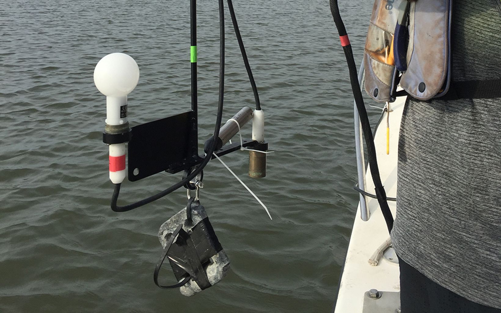 Light Sensor Scientists lower this sensor over the side of the boat to determine both how much light is being absorbed and how much is being scattered by particles in the water. © TNC