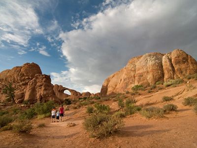 Family hiking at Arches National Park.