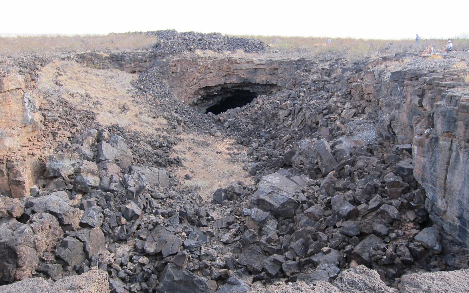 One of several entrances to Jornada Bat Caves, which are actually long lava tubes.