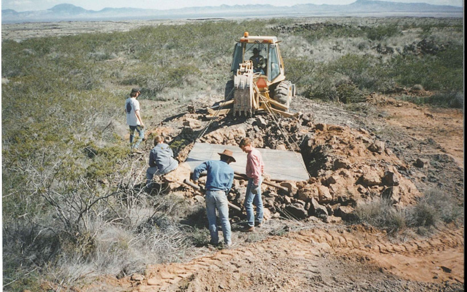 Armendaris Ranch staff work with the University of New Mexico and TNC to plug a “skylight” excavated by miners to provide easier access to bat guano in the lava cave below.