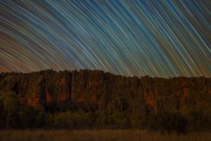 The clear night skies in Winjana National park of Western Australia are incredible. The landscape is dramatic displaying the vibrant red rocks that overpower the landscape. 