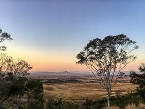 Looking over a vast Australian landscape at sunset.