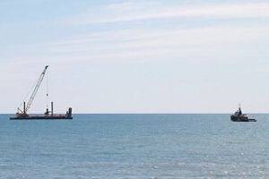 Barge and equipment that assist in the shellfish reef restoration build
