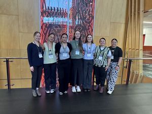 A group of females posing for a photo.