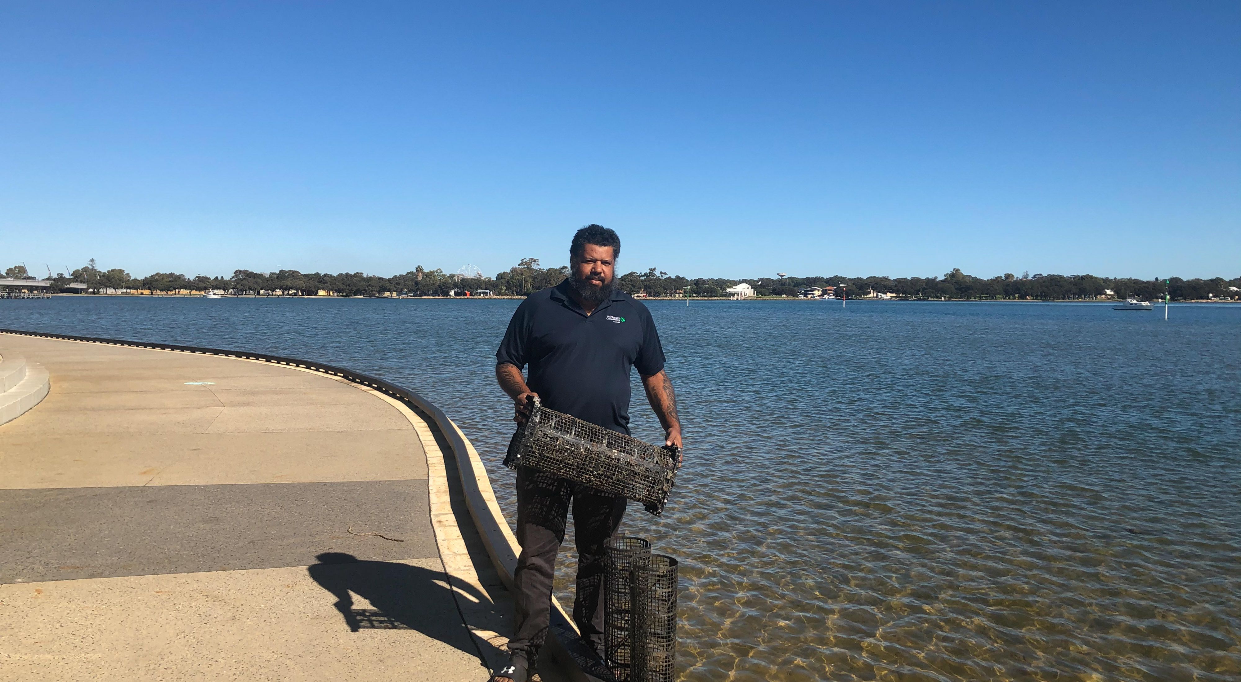 with mussel baskets besides the Peel-Harvey Estuary, Western Australia