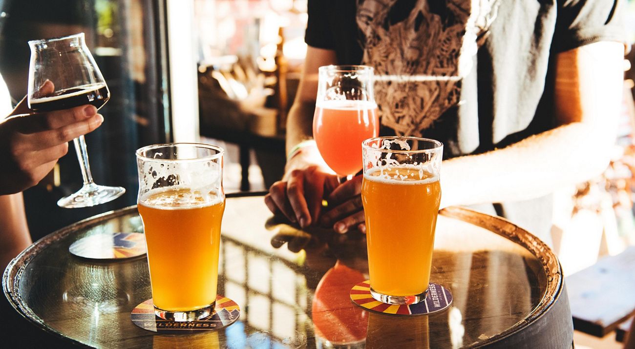 Sinagua Malt beers on a table at Arizona Wilderness Brewing in Gilbert, Arizona.