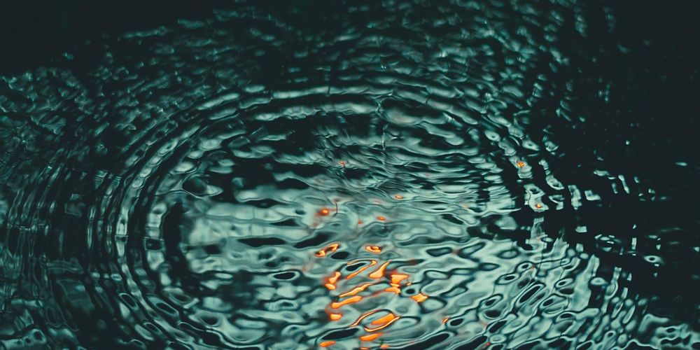 Ripples in dark water.