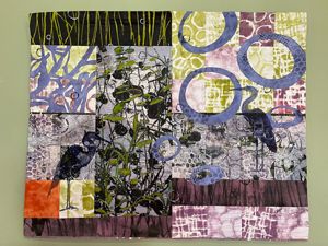 'What the Waterlilies Sing' by Bobbi Baugh: surface design on fabric constructed by collage and stitch.
