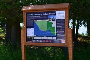 A photo of the new temporary informational kiosk at the Narnia Trail turnout. The sign includes a map of the trail as well as things to know. 