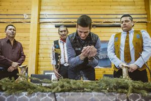 Hadley Archer of Nature United and members of the Lutsel K’e Dene First Nation sign a grant agreement for the Thaidene Nene Fund on February 14, 2019.