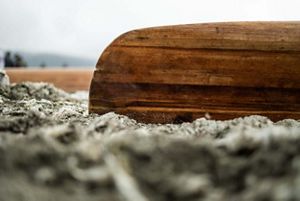 Canoe laying upside down.