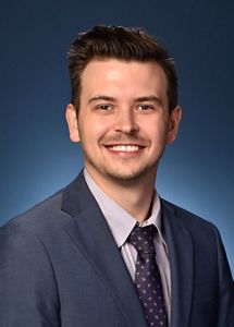 A headshot of Michael Cantwell.