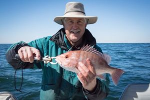Fisherman Warren Hupman with red snapper