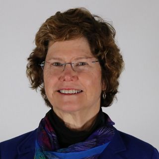 A headshot of Carol Collier.