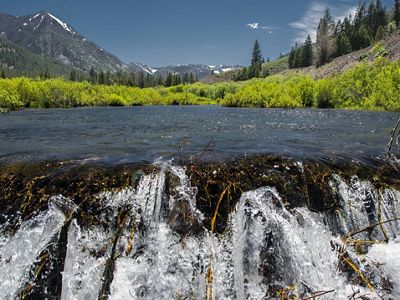 A stream rolling down a mountain pass.