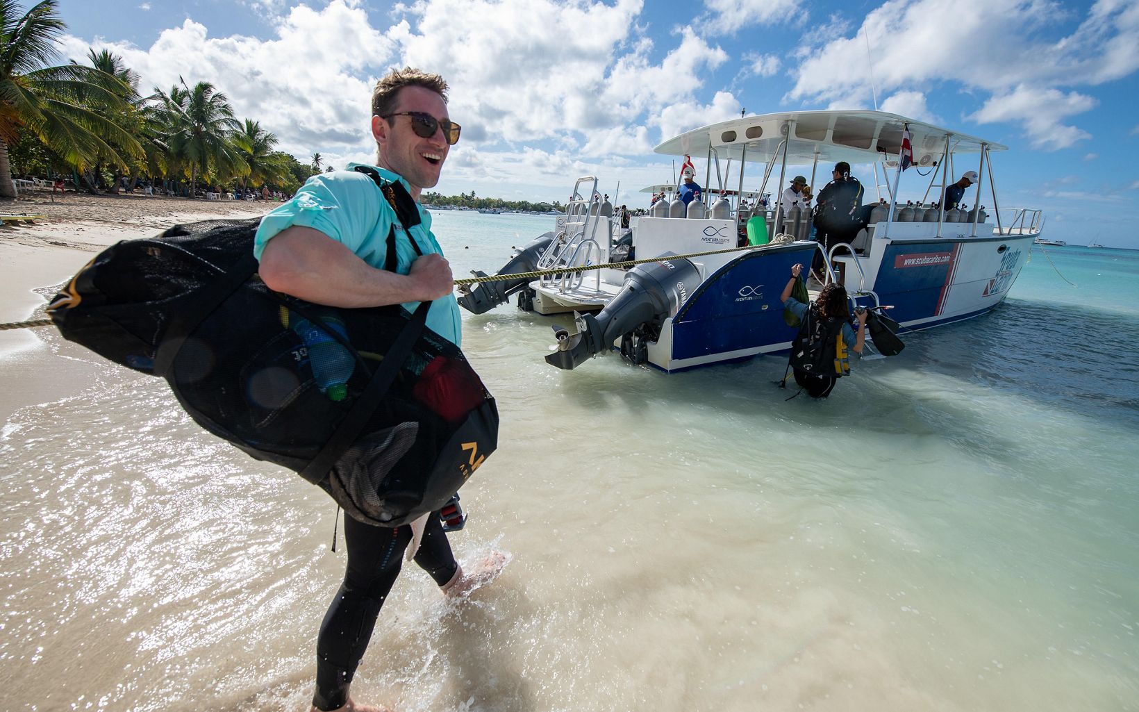 
                
                  Joe Pollock Coral Strategy Director Joe Pollock heads to the boat for a dive off the coast of the Dominican Republic.
                  © Paul A. Selvaggio/TNC
                
              