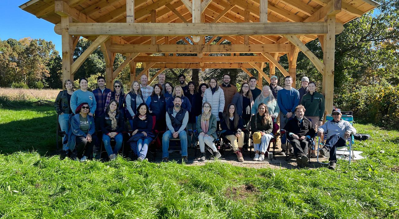 The Nature Conservancy's Connecticut staff gathers outdoors for a group photo.