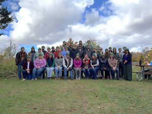 The Nature Conservancy's Connecticut staff gathers outdoors for a group photo.