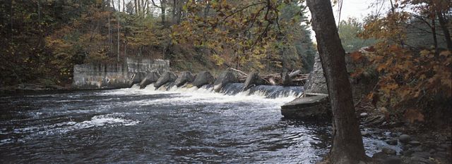Photo of the dam prior to its 2004 demolition on the Neversink River at Cuddebackville, New York.