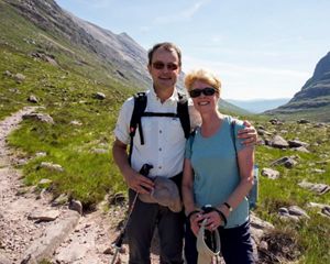 Jack and Carolyn Long posed in front of scenic mountain