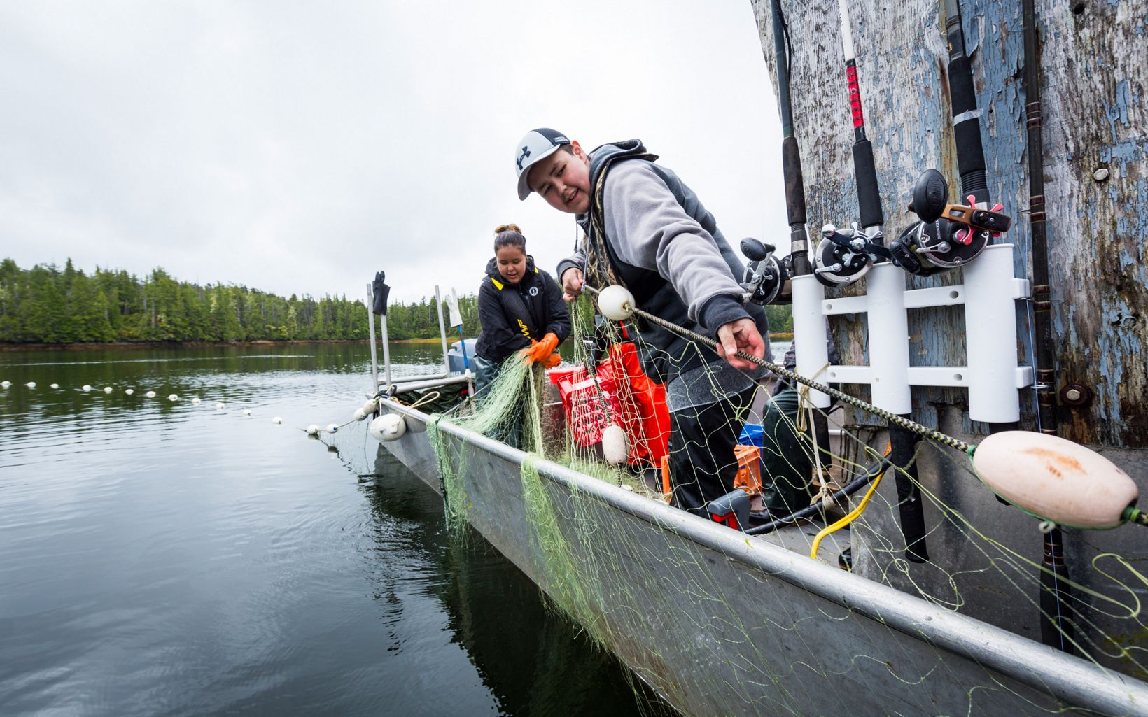 Leadership Skills SEAS Interns Julianne Mason and Robert Duncan try sockeye salmon fishing with gill nets as part of the SEAS  program in Kitasoo Bay, BC, Canada. © Jason Houston