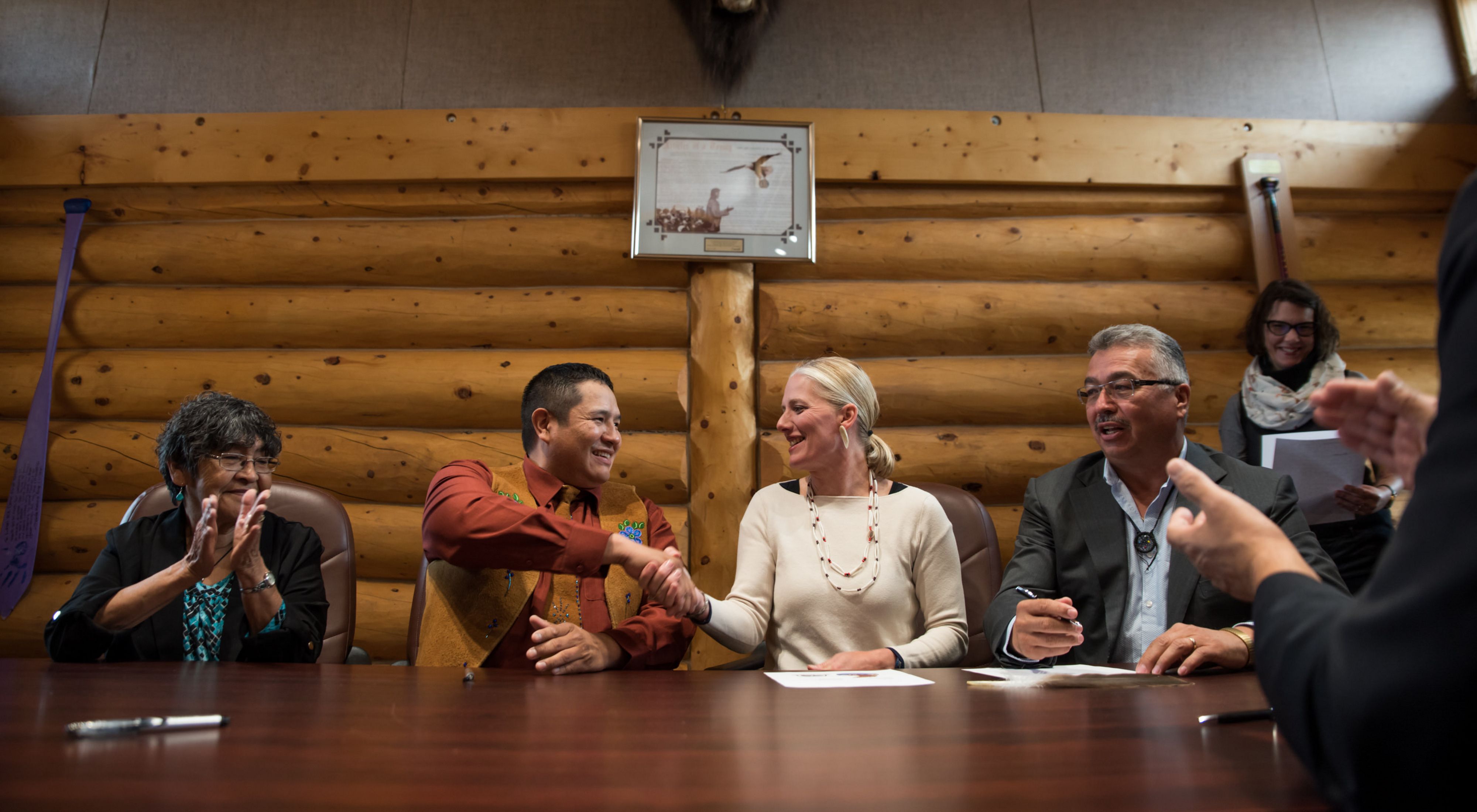Minister of Environment Catherine McKenna and Łutsël K'e Dene First Nation Chief Darryl Marlowe celebrate after signing agreements to establish Thaidene Nëné.