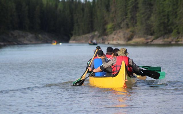 Students in a canoe in Manitoba 