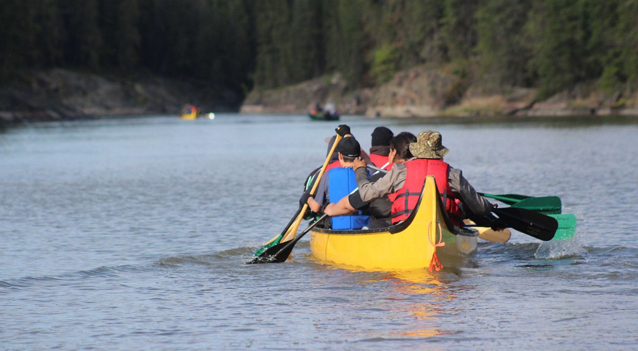 People kayaking.