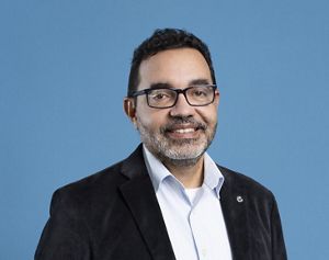 Carlos Garcia smiles for a photo.