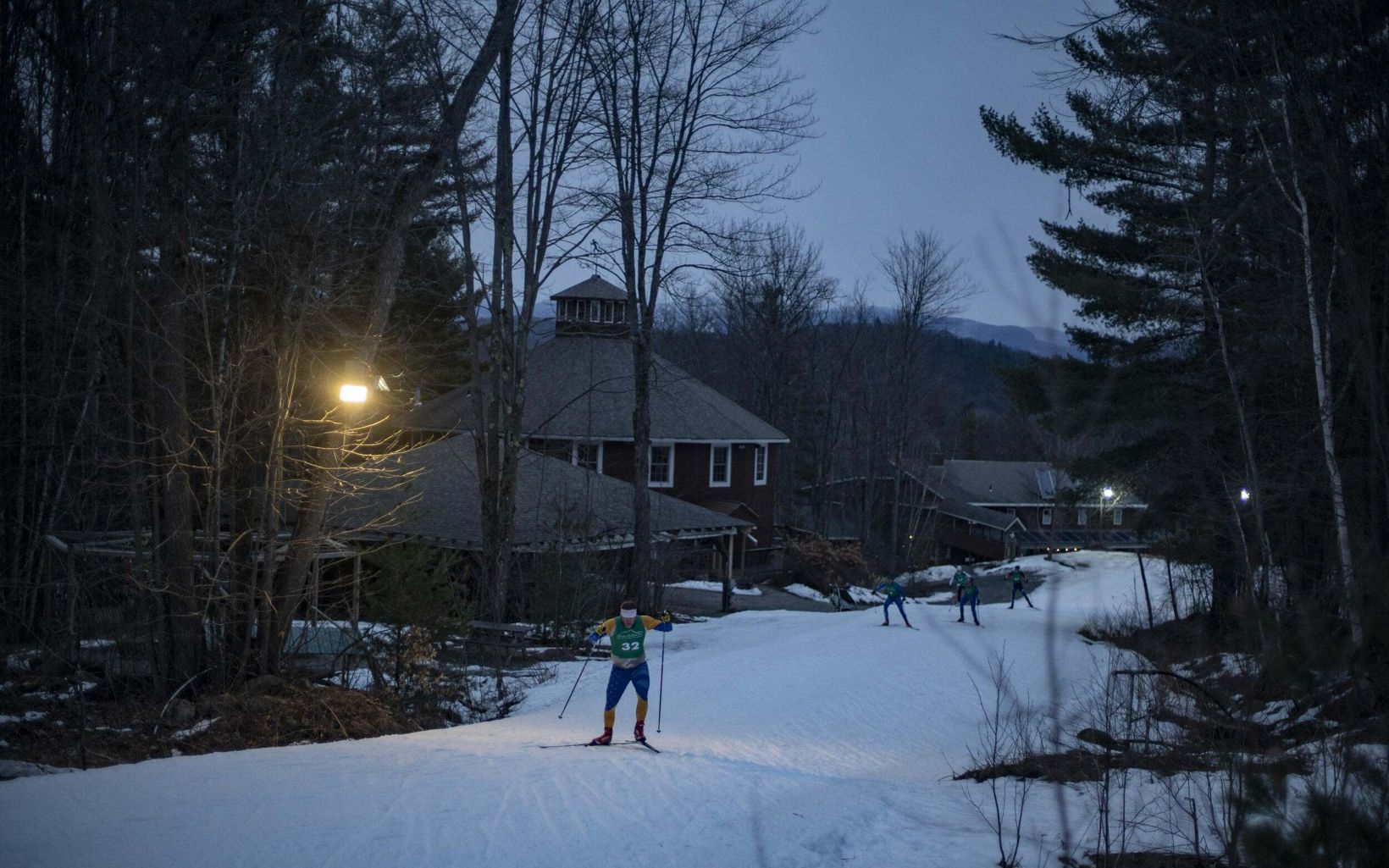 X-Country Skiing at Dusk Sleepy Hollow in Vermont is a popular winter recreation place in Huntington Vermont © John Tully