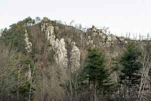 A geological formation emerges from a mountain.