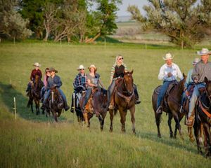 Doan family riding horses.