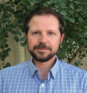 Headshot of Drew Rayburn.