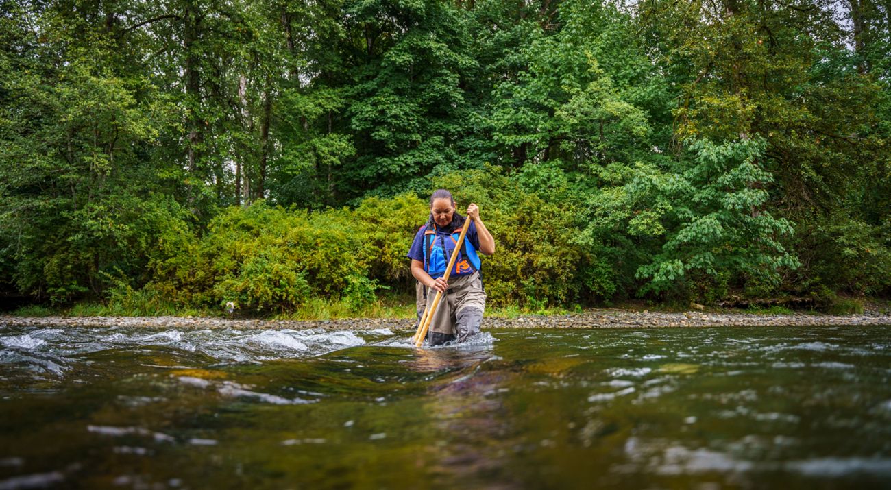 Person working in a river.