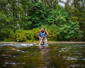 Person working in a river.