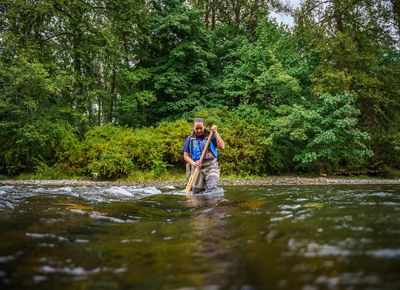 Person working in a river.