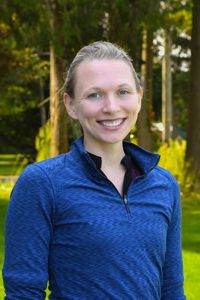 Headshot of Nicole Wooten outdoors.