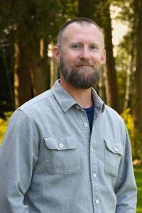 A headshot of David Cavanaugh.