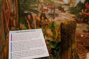 A sign about the Pocomoke river's history is displayed at a museum. 