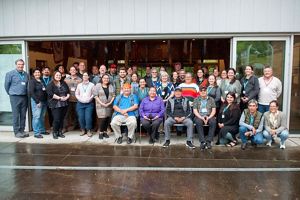 A group of people posing for a group picture.