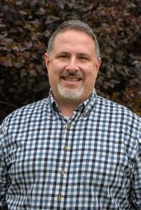 A headshot of Johnathan Niles.