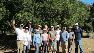 Photo of volunteers posing together during an exciting day performing conservation work at TNC's Jack and Laura Dangermond Preserve. 