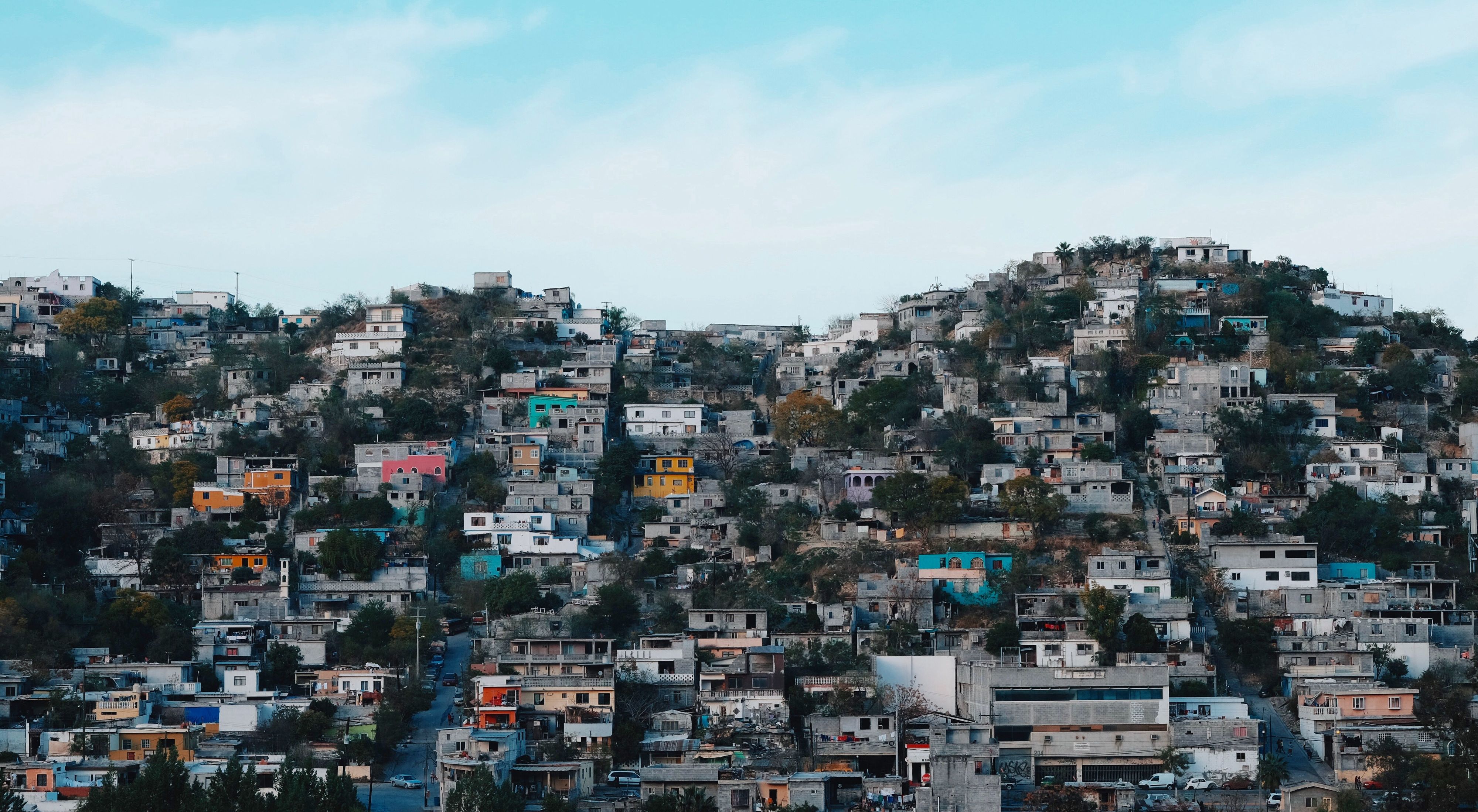 Developed hillsides loom over the city of Monterrey.